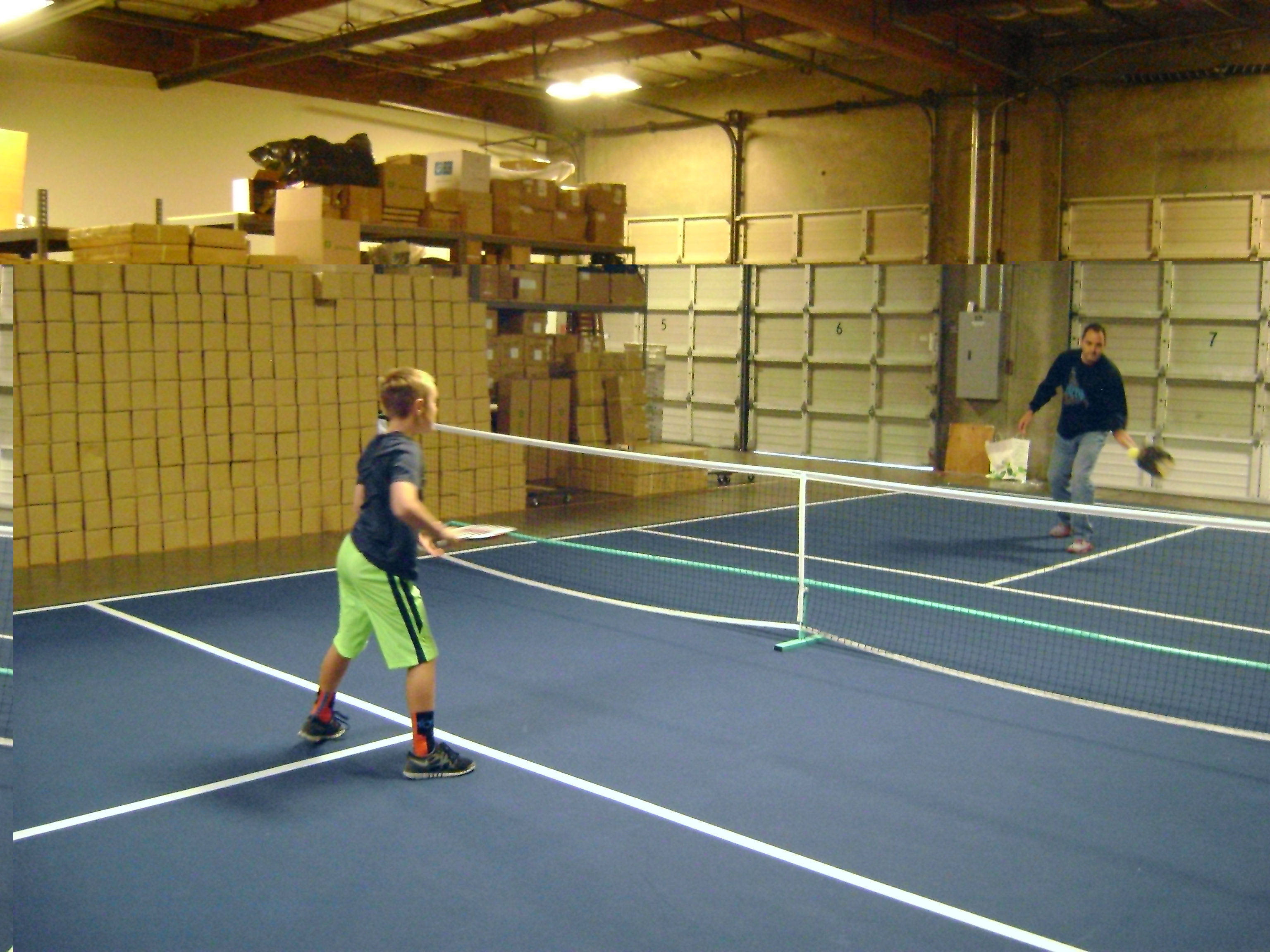 Mark and his son Mitch playing pickleball at PickleballCentral.com