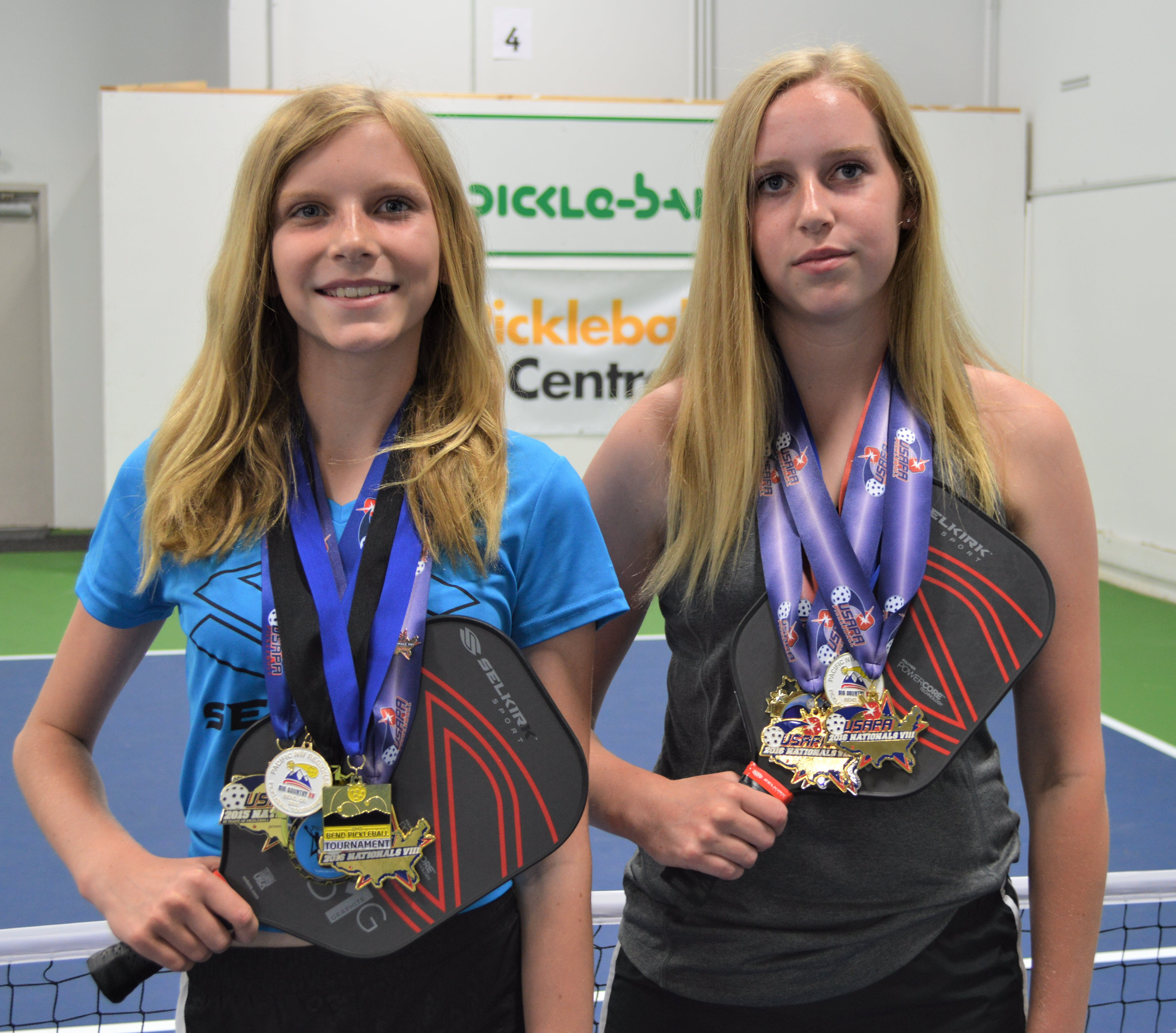 McKenna and Kendall Hastings at Pickleball Station with their winning medals