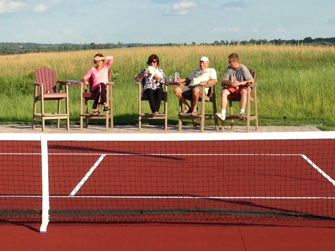Watching a game of pickleball on completed court