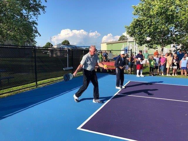 New York State Senator Michael H. Ranzenhofer making the first official serve on the Town of Riga